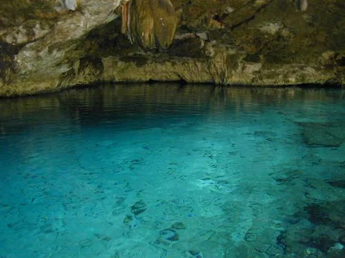 Clear turquoise water inside Cenote Dos Ojos